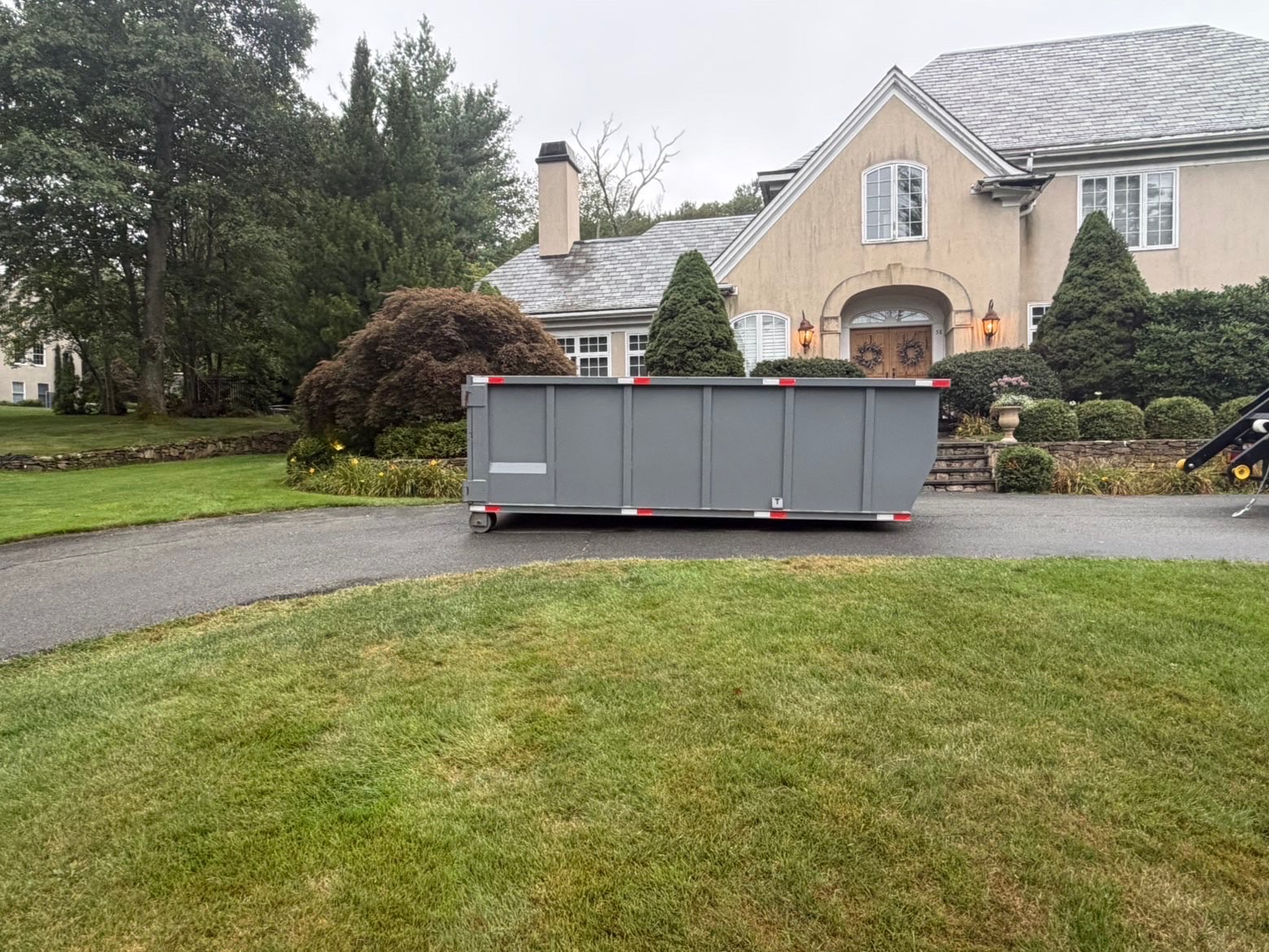 Dumpster Dudes truck and dumpster